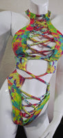 Colorful bikini top on a white surface